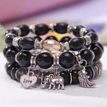 Load image into Gallery viewer, HoliStone Multi Strand Bohemian Style Coral Bead Bracelet with Luck Elephant Love and Wing ? Anxiety Stress Relief Energy Balancing Lucky Charm Bracelet for Women and Men